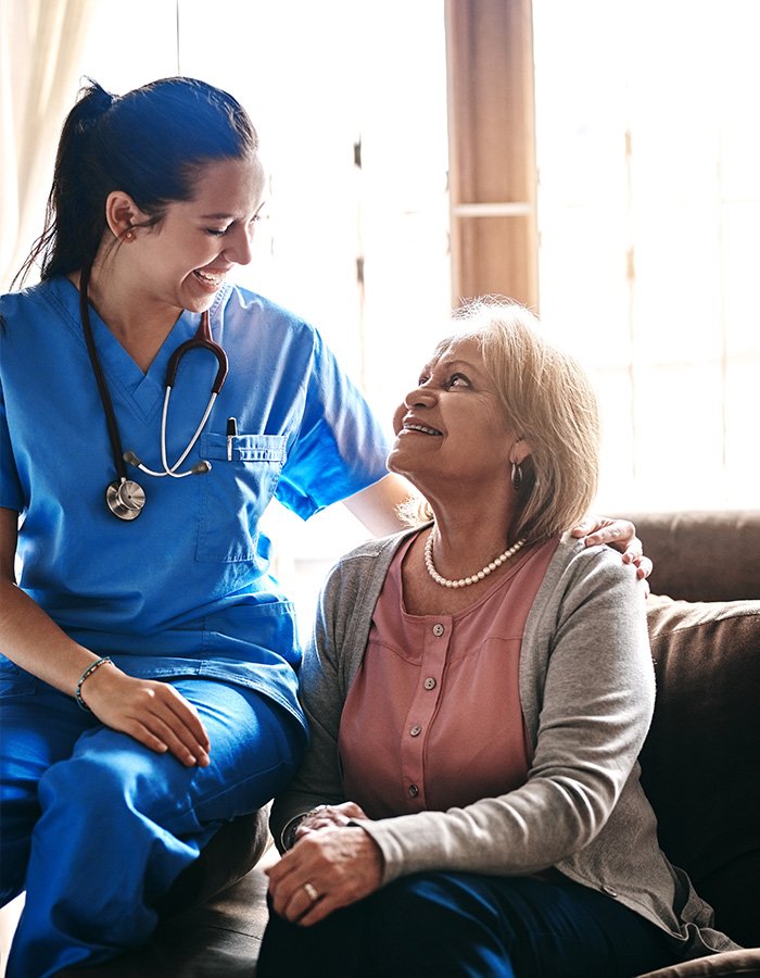 Care professional delivering genuine compassionate support to seniors